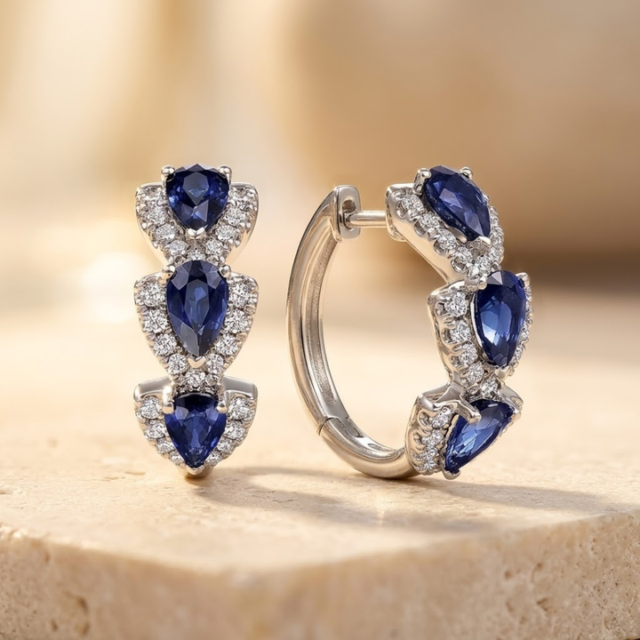 Halo-Designed Silver Hoop Earrings Adorned with Sapphire Stones