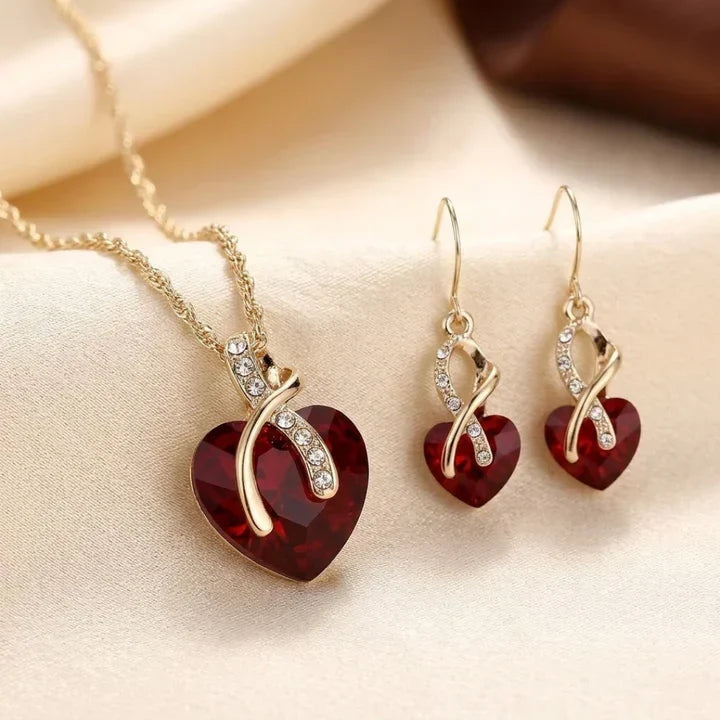 Ruby and Gold Heart-Shaped Twisted Jewelry Collection