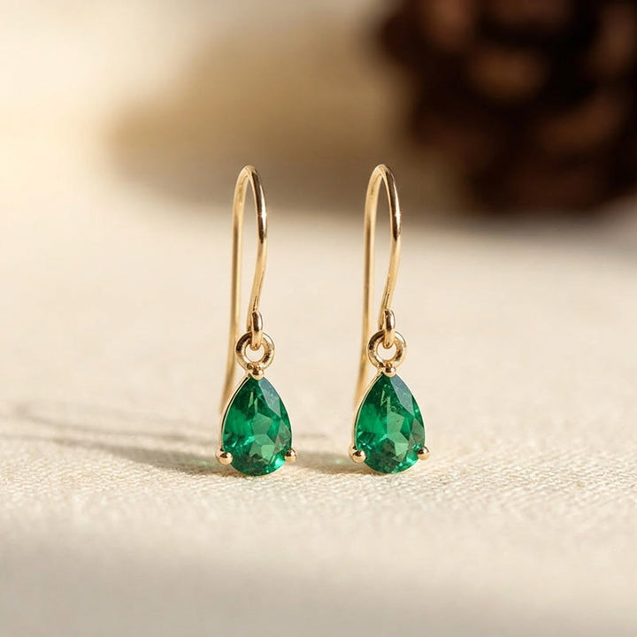Gold Drop Earrings with Emerald Teardrop Design