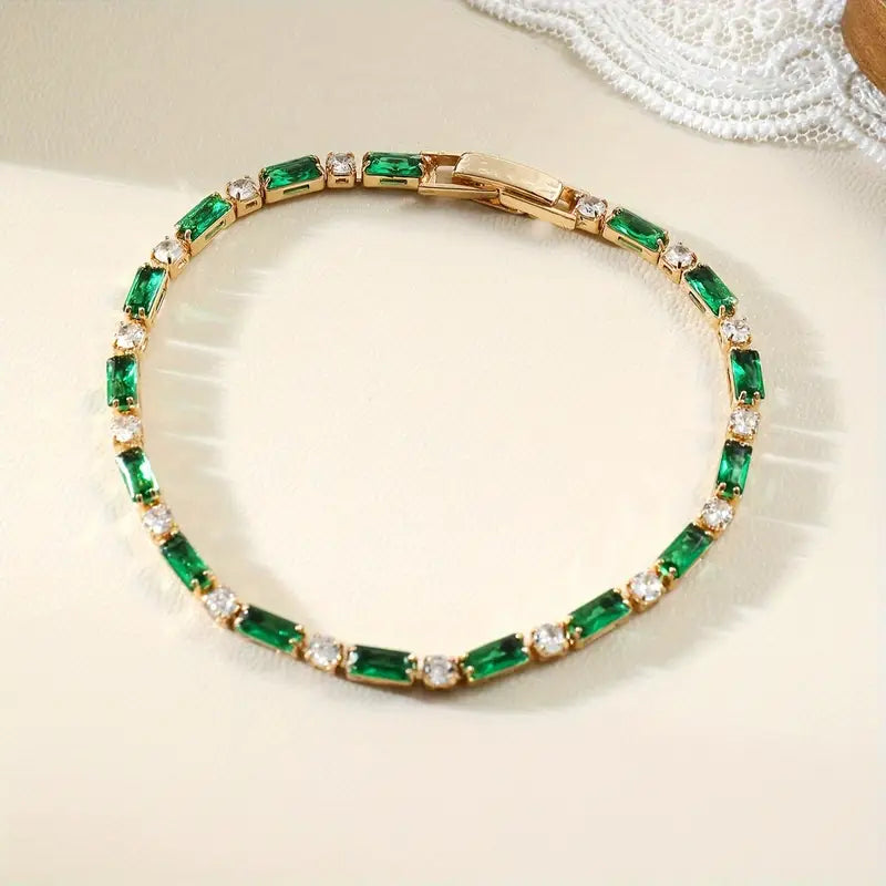 Emerald and Gold Alternating Tennis Bracelet