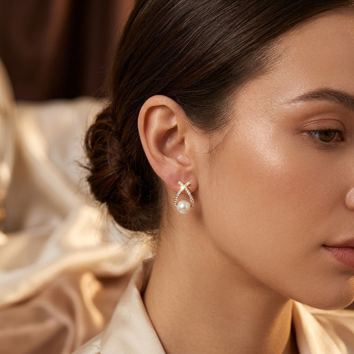 Gold Crossed Pearl Stud Earrings