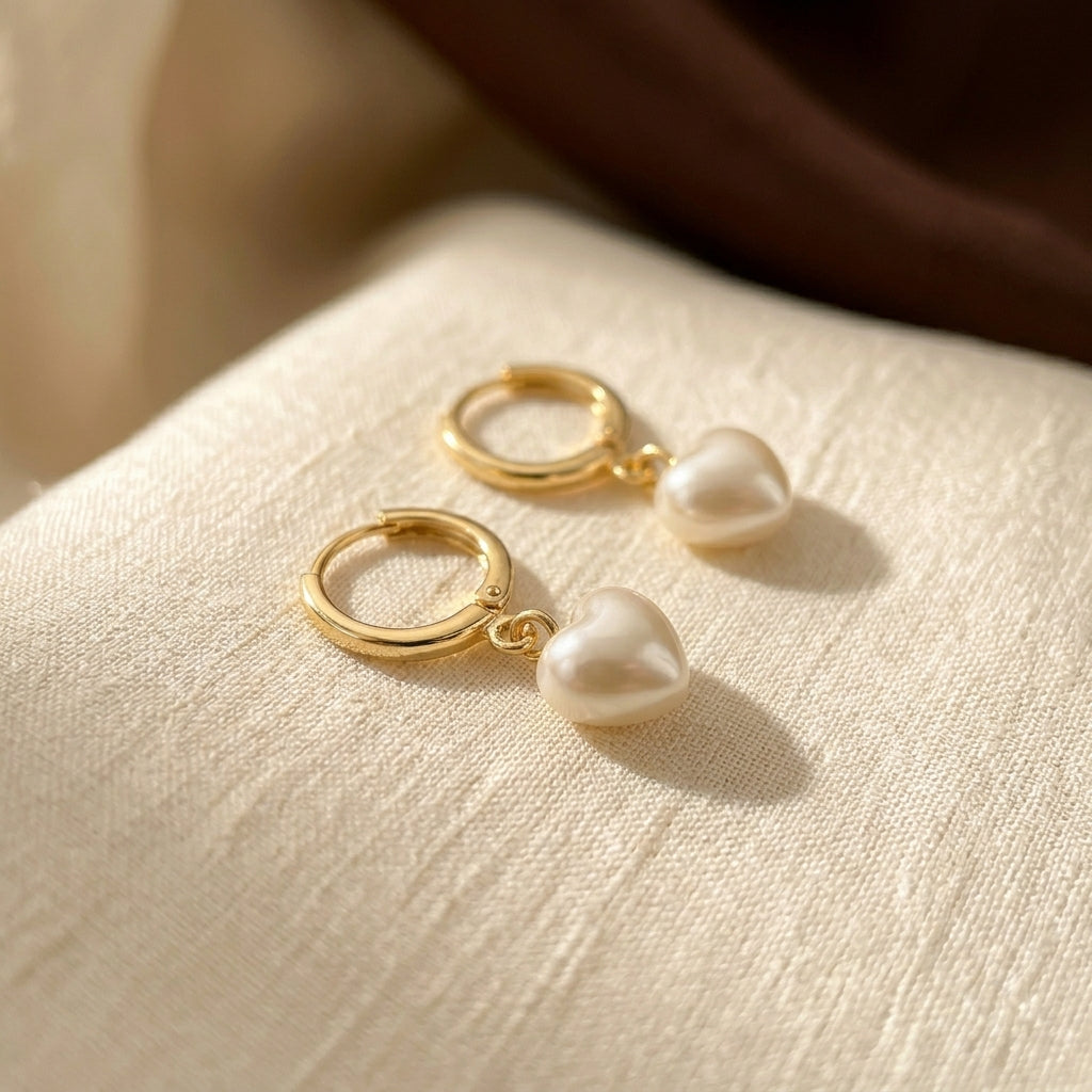 Golden Pearl Drop Earrings with Heart Design