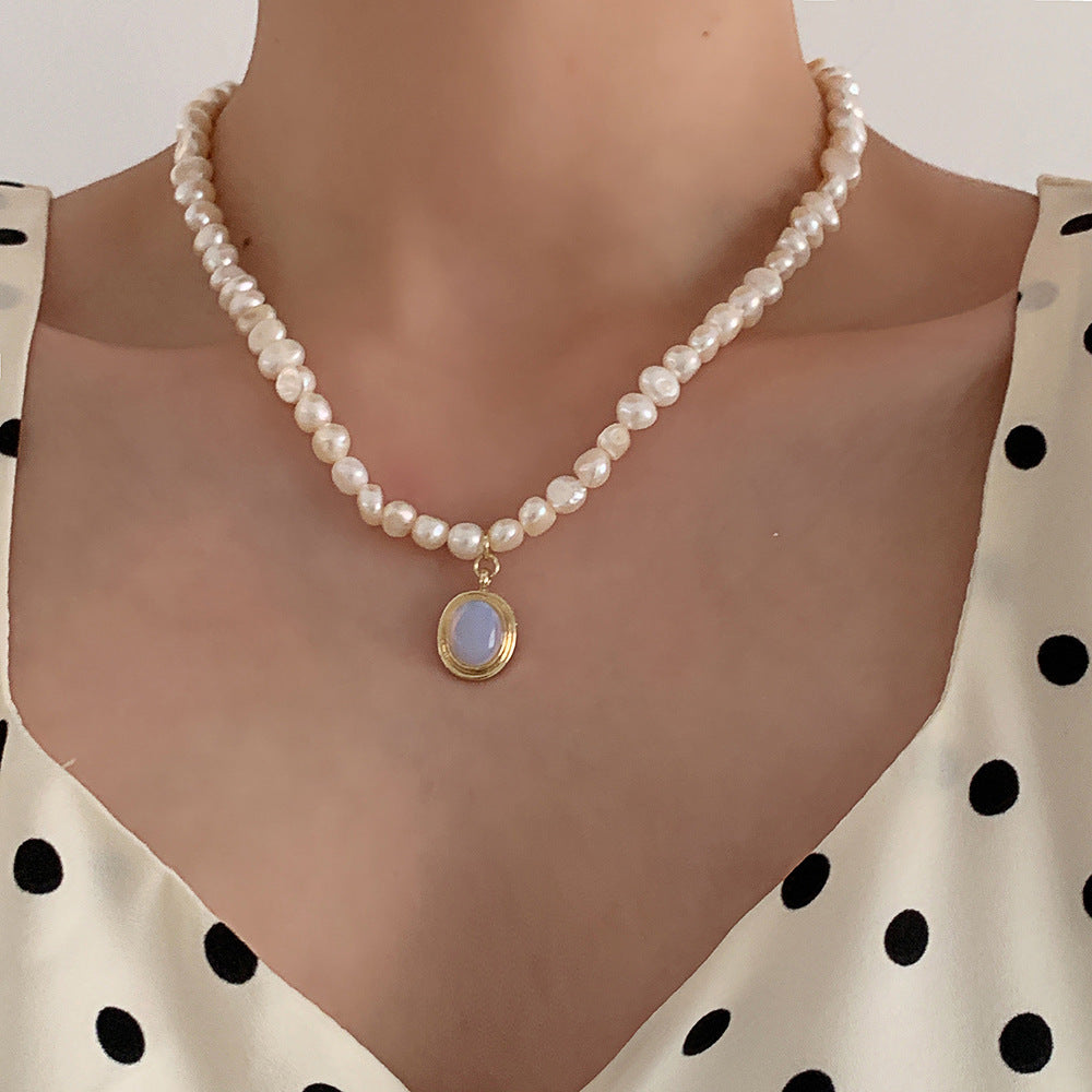 Luminous Moonstone Necklace with Pearl Details