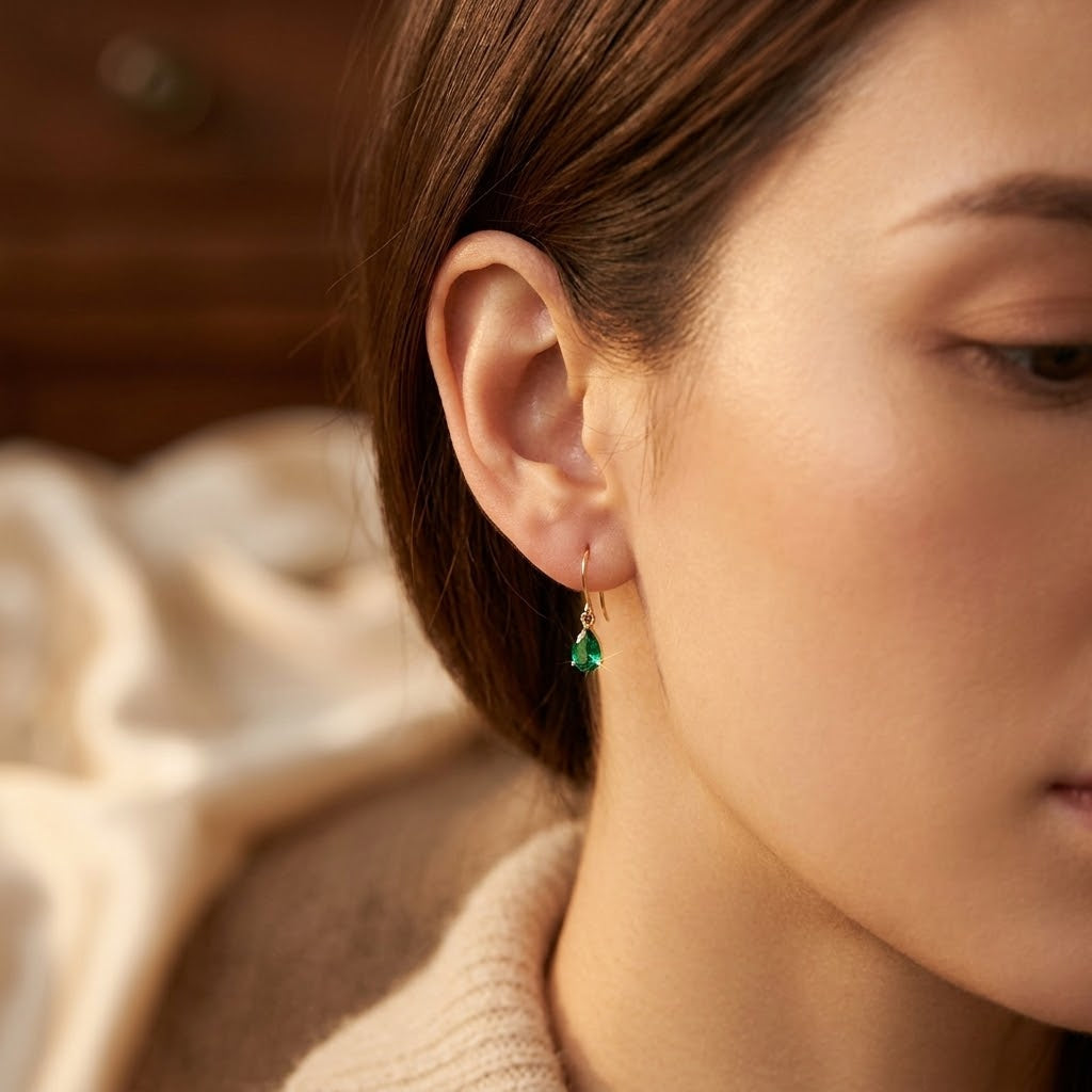 Emerald Teardrop Design Gold Dangle Earrings