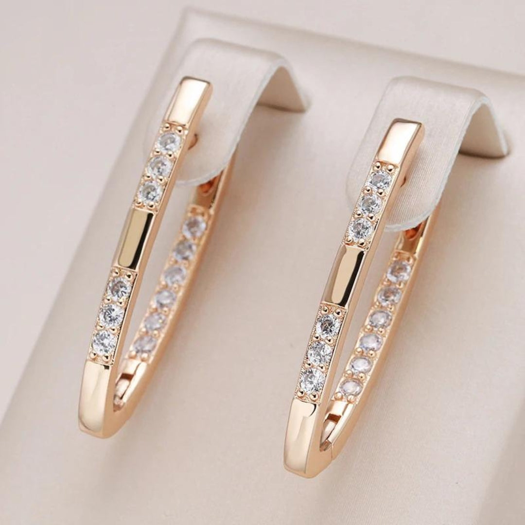 Elegant Gold Earrings Featuring Zirconia Details