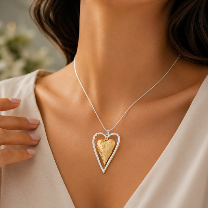 Elegant Gold and Silver Heart Pendant Necklace