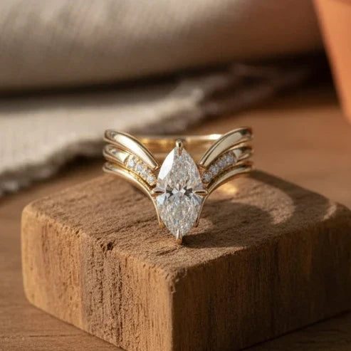 Gold Ring with Drop Crown Design
