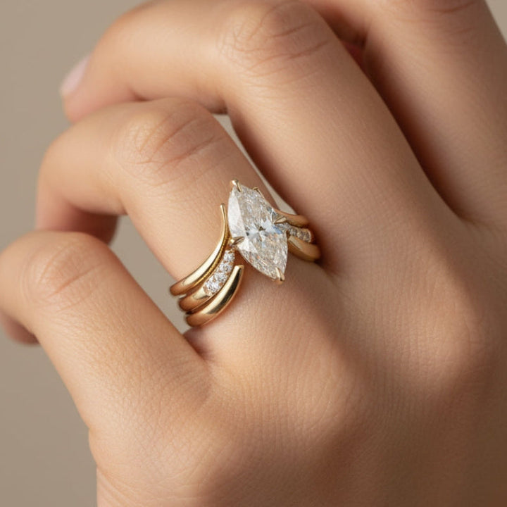 Golden Ring with Draped Crown Design