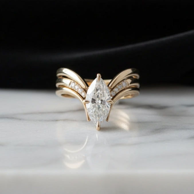 Golden Ring with Draped Crown Design
