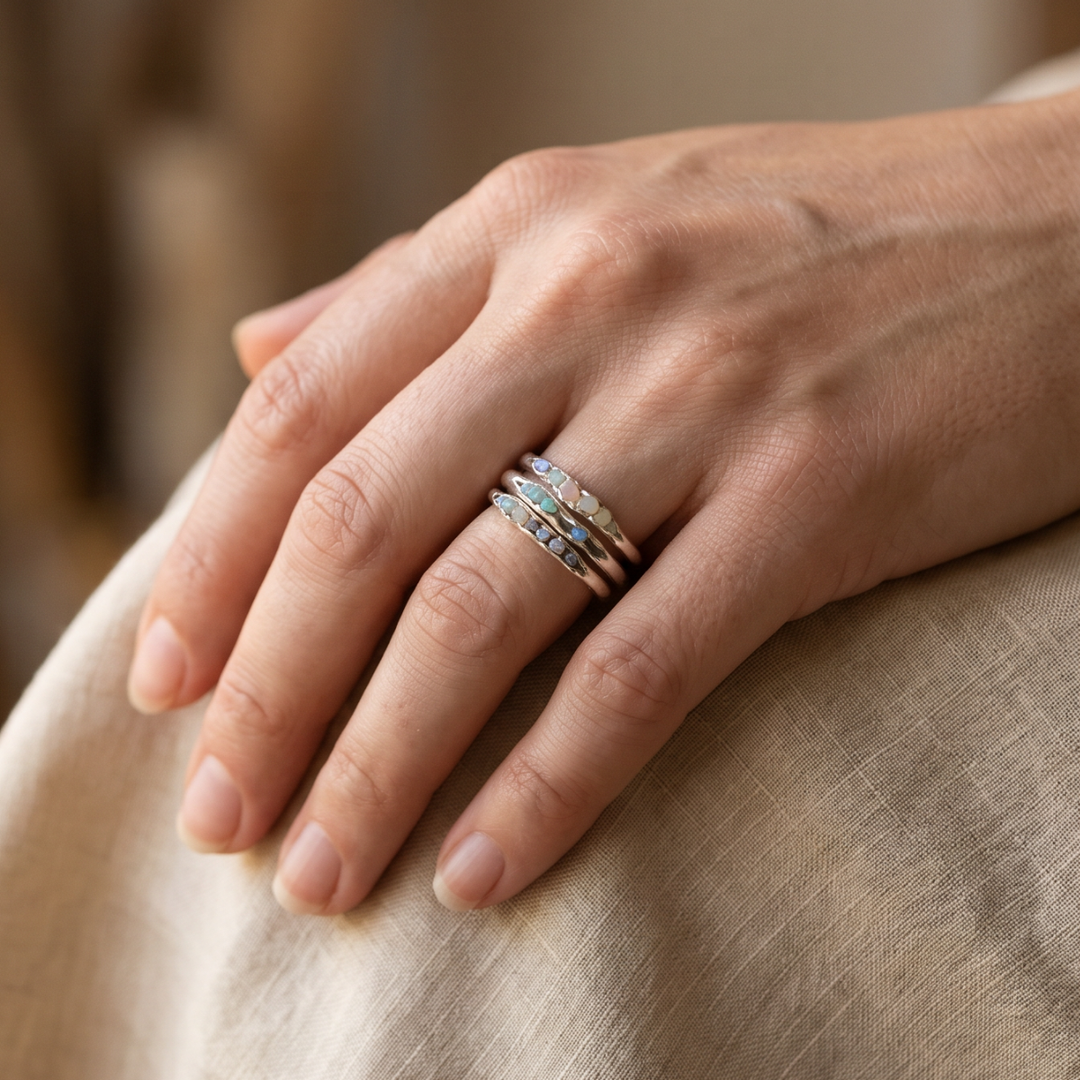 Antique Silver Ring Adorned with Stacked Blue Gemstones