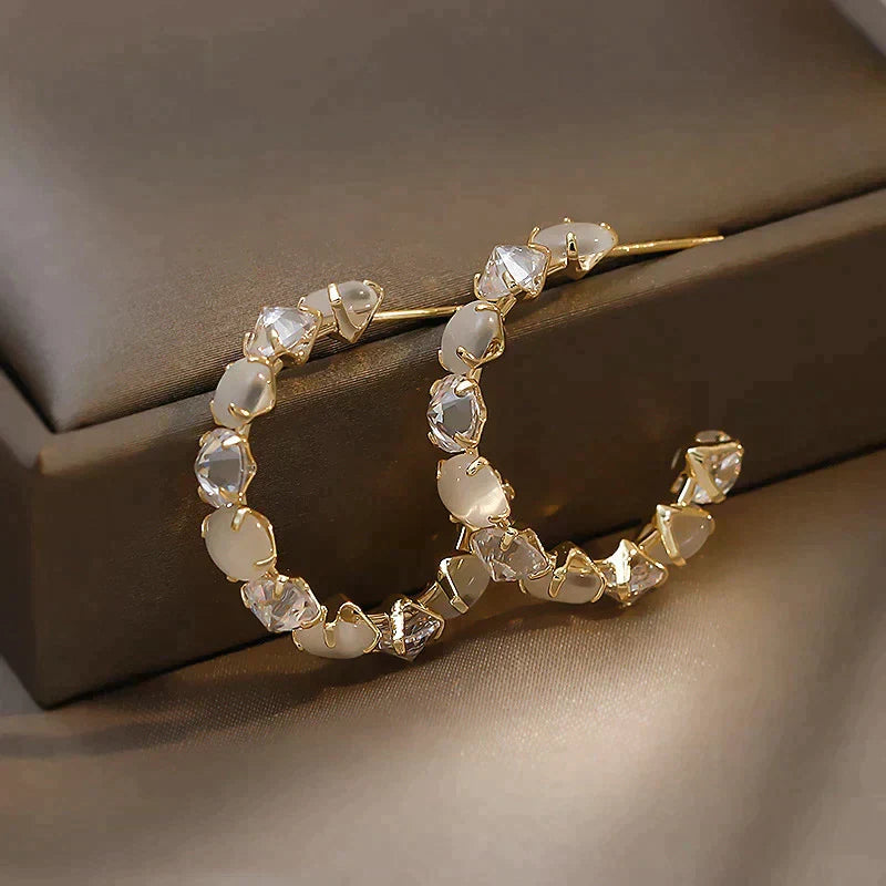 Elegant Gold Earrings with White Opal and Crystal Accents