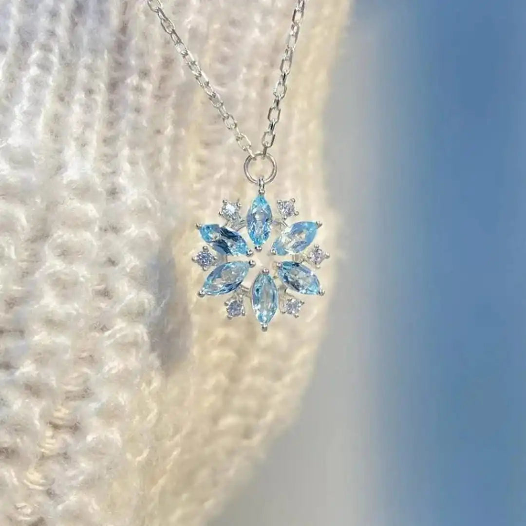 White Gold Flower Pendant Necklace with Blue Snowflake Accent