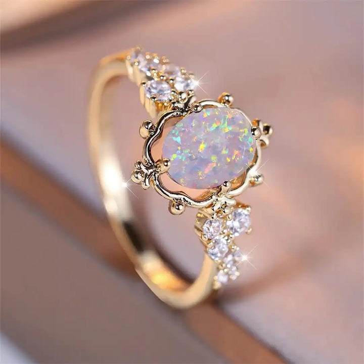 Oval Floral Ring Featuring a White Fire Opal Gemstone