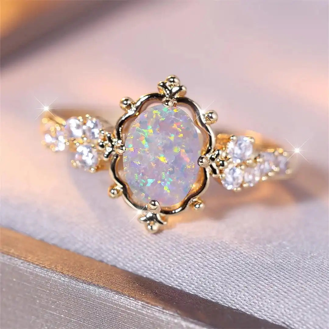 Oval Floral Ring Featuring a White Fire Opal Gemstone