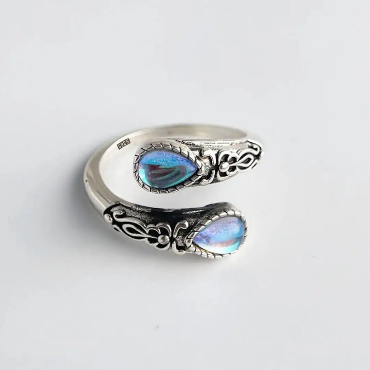 Vintage Adjustable Silver Ring Featuring Blue Stone