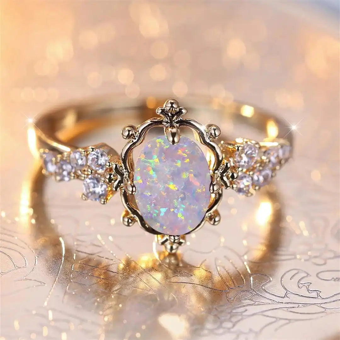 Oval Floral Ring Featuring a White Fire Opal Gemstone