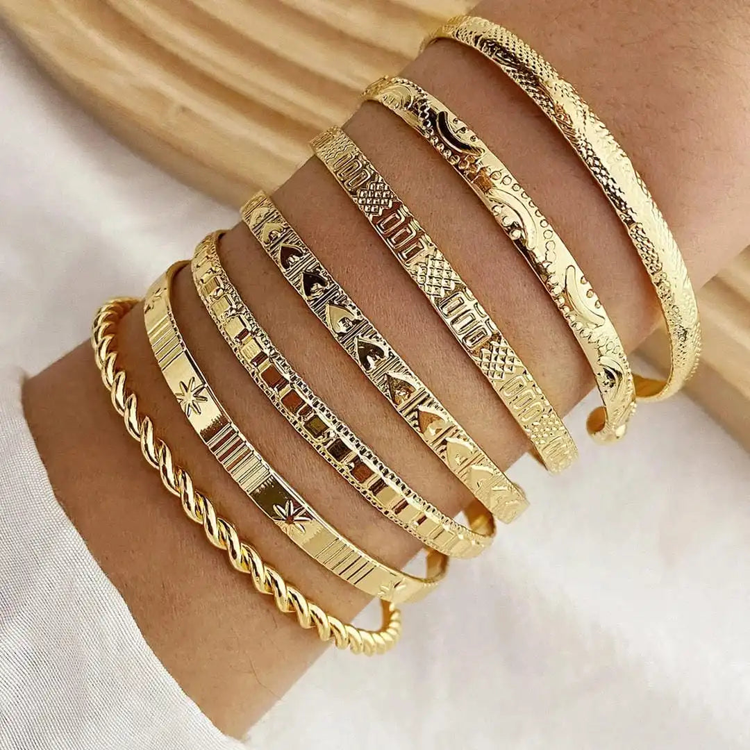 Gold Resort Bracelet Collection Featuring an Open Bangle Style