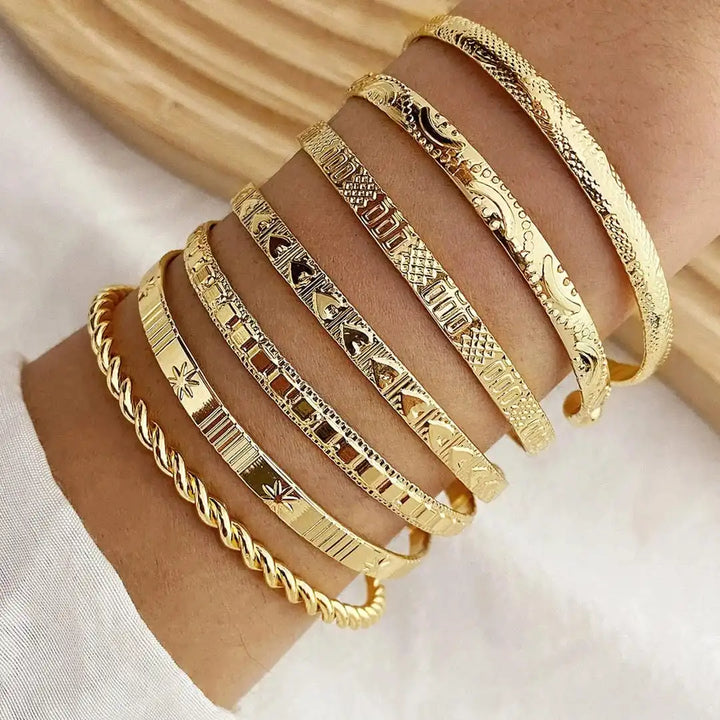 Gold Resort Bracelet Collection Featuring an Open Bangle Style