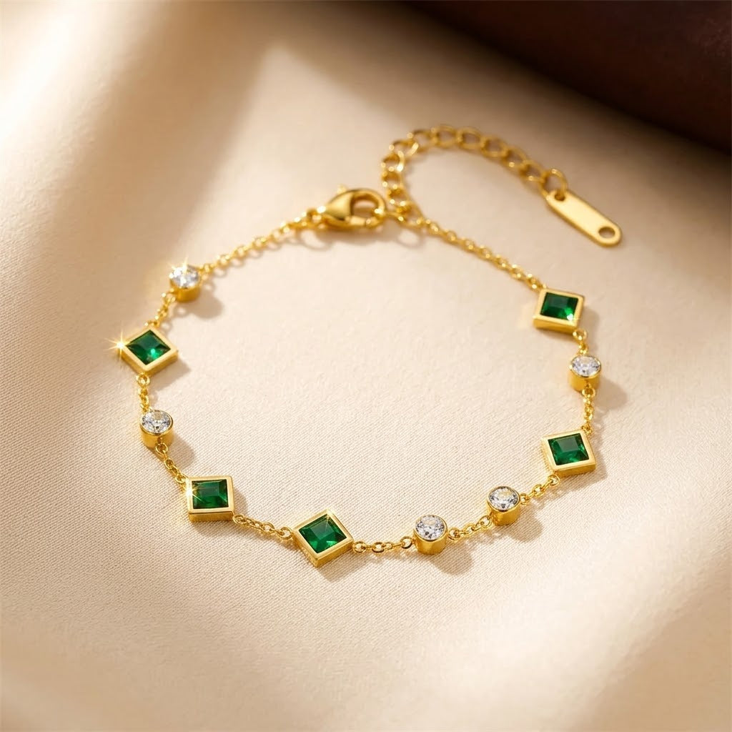 Gold and Emerald Charm Bracelet