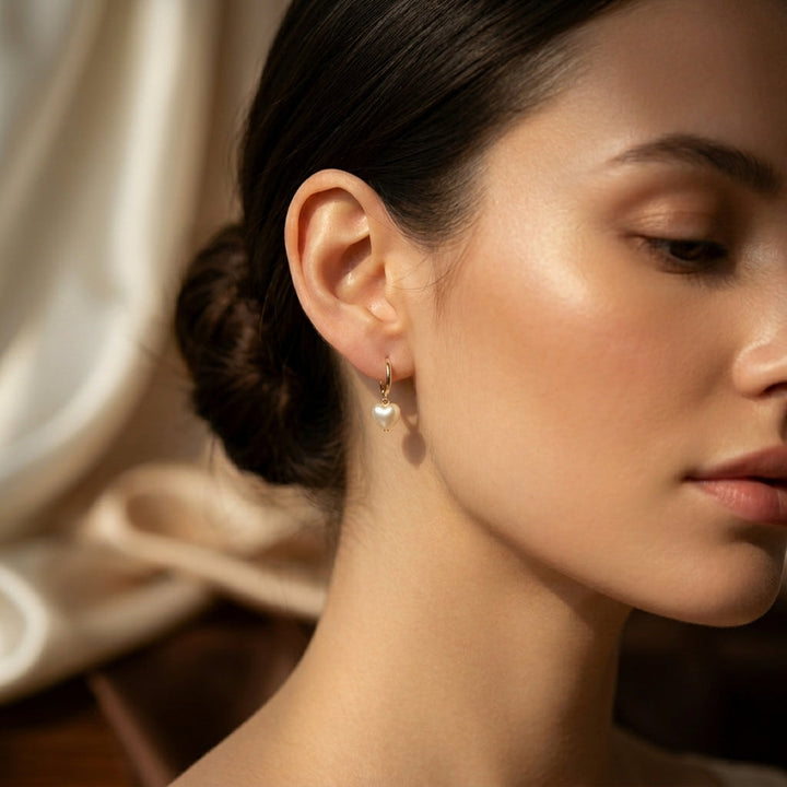 Golden Pearl Drop Earrings with Heart Design