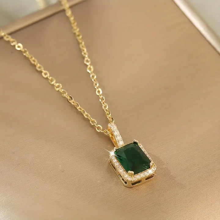 Emerald and Gold Rectangular Halo Pendant Necklace