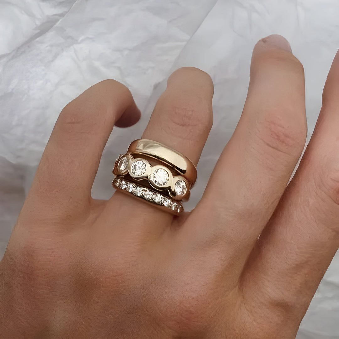 Collection of handcrafted radiant gold rings