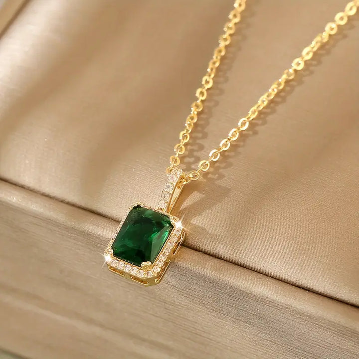 Emerald and Gold Rectangular Halo Pendant Necklace