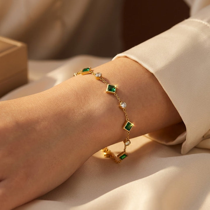 Gold and Emerald Charm Bracelet