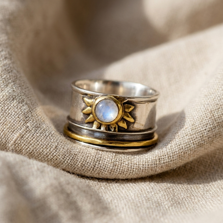 Two-Tone Sun Moonstone Ring with a Wide Silver and Gold Band