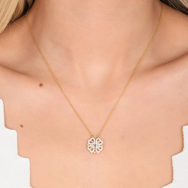 Gold Clover Necklace Adorned with a Heart-Shaped Zircon Pendant