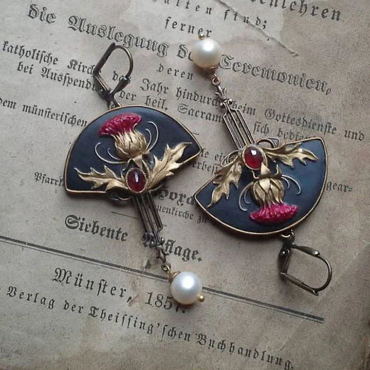Bohemian-Inspired Earrings Adorned with Pearls and Red Gemstones