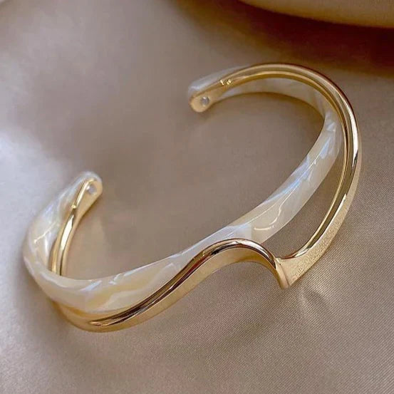 Sophisticated Gold Bracelet Adorned with White Opal Highlights