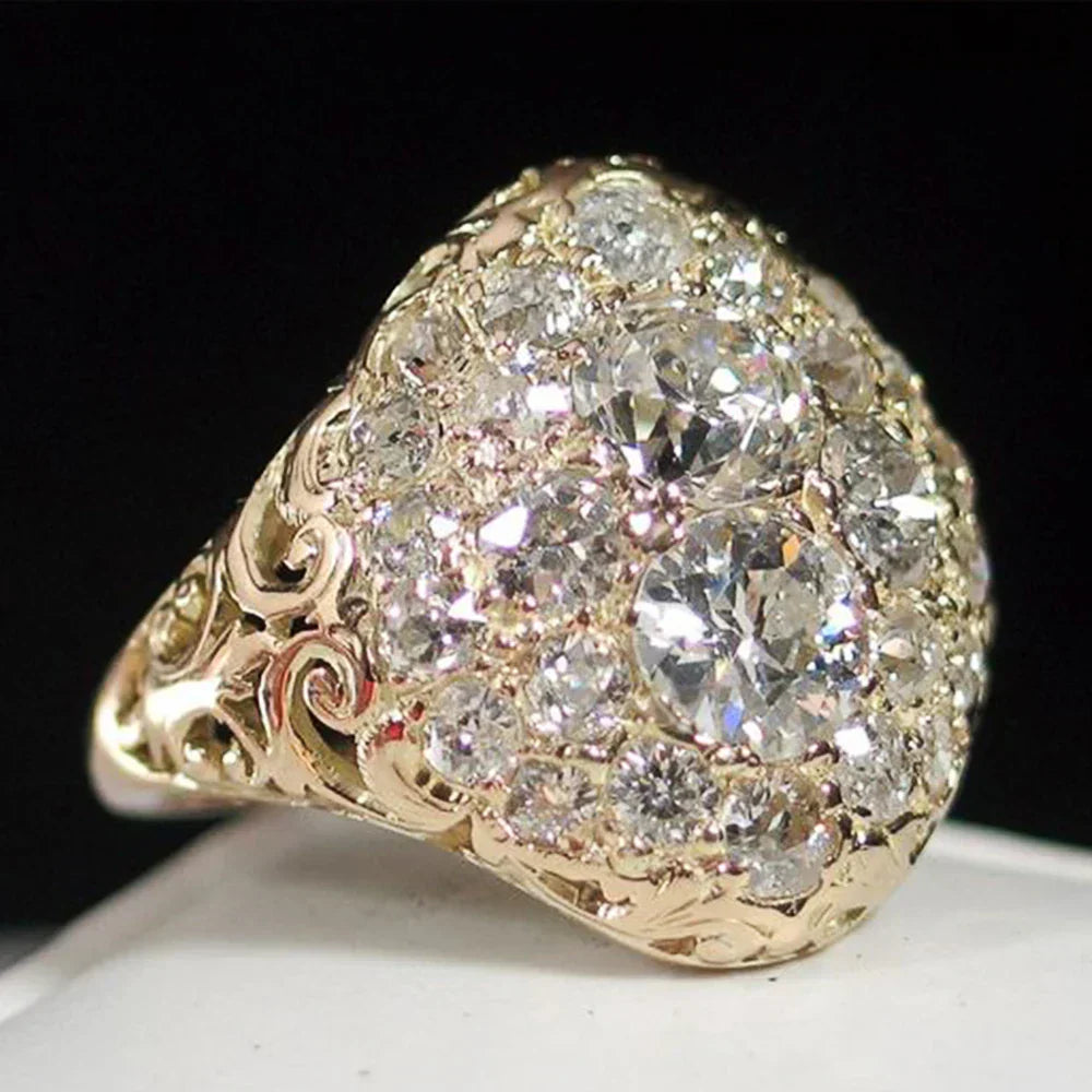 Antique gold ring adorned with circular diamonds