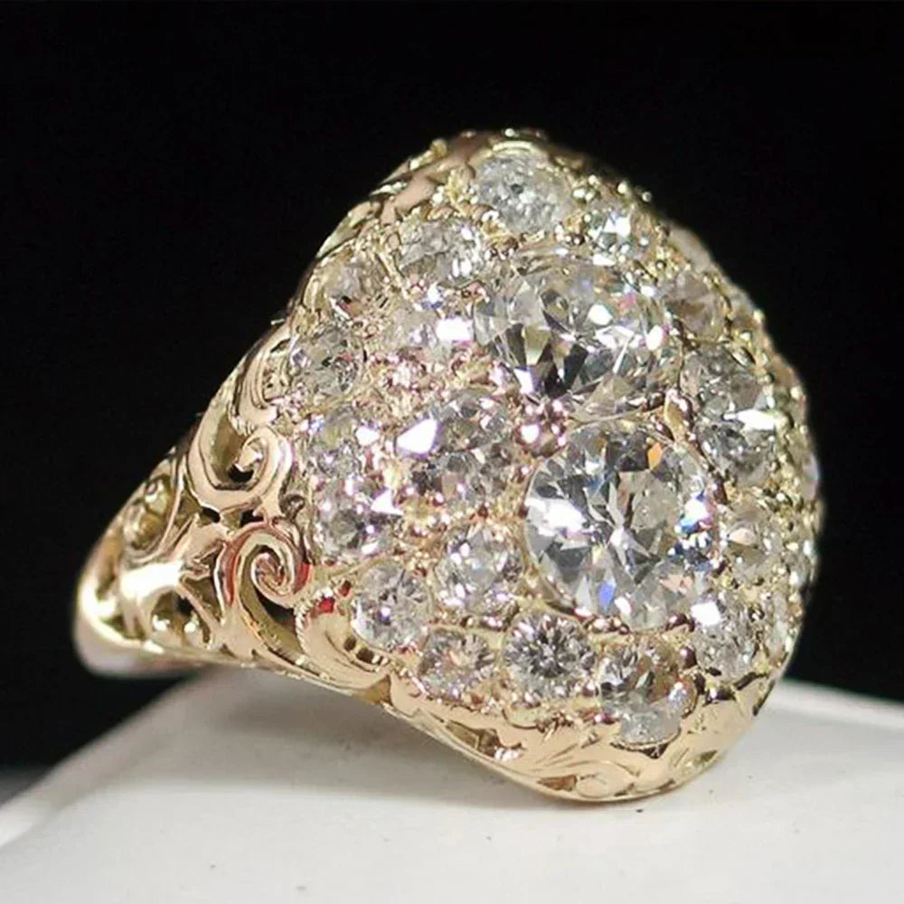 Antique gold ring adorned with circular diamonds