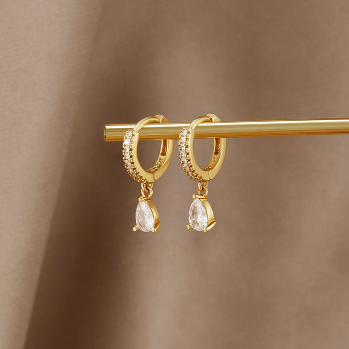 Opulent Gold Earrings Adorned with Crystals